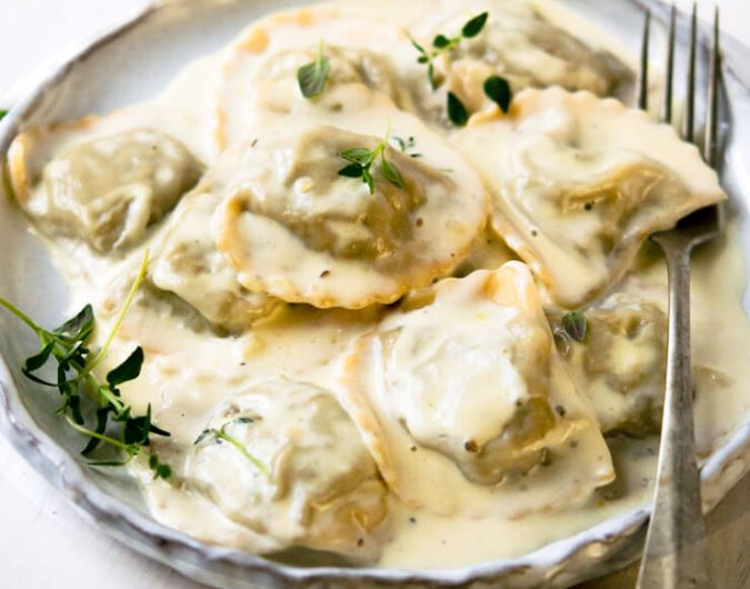 Mushroom Ravioli With Parmesan Cream Sauce