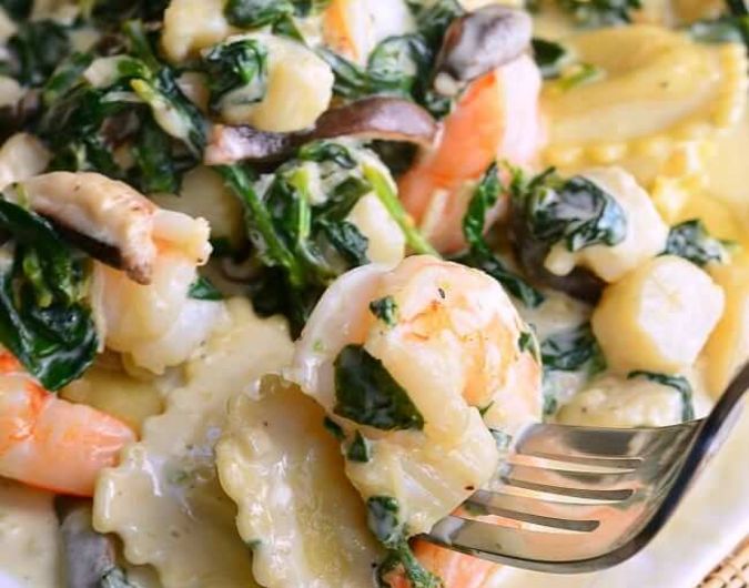 Seafood Ravioli with Spinach and Mushrooms in Garlic Cream Sauce